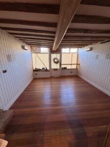 oak floor sanded and treated wall panneling